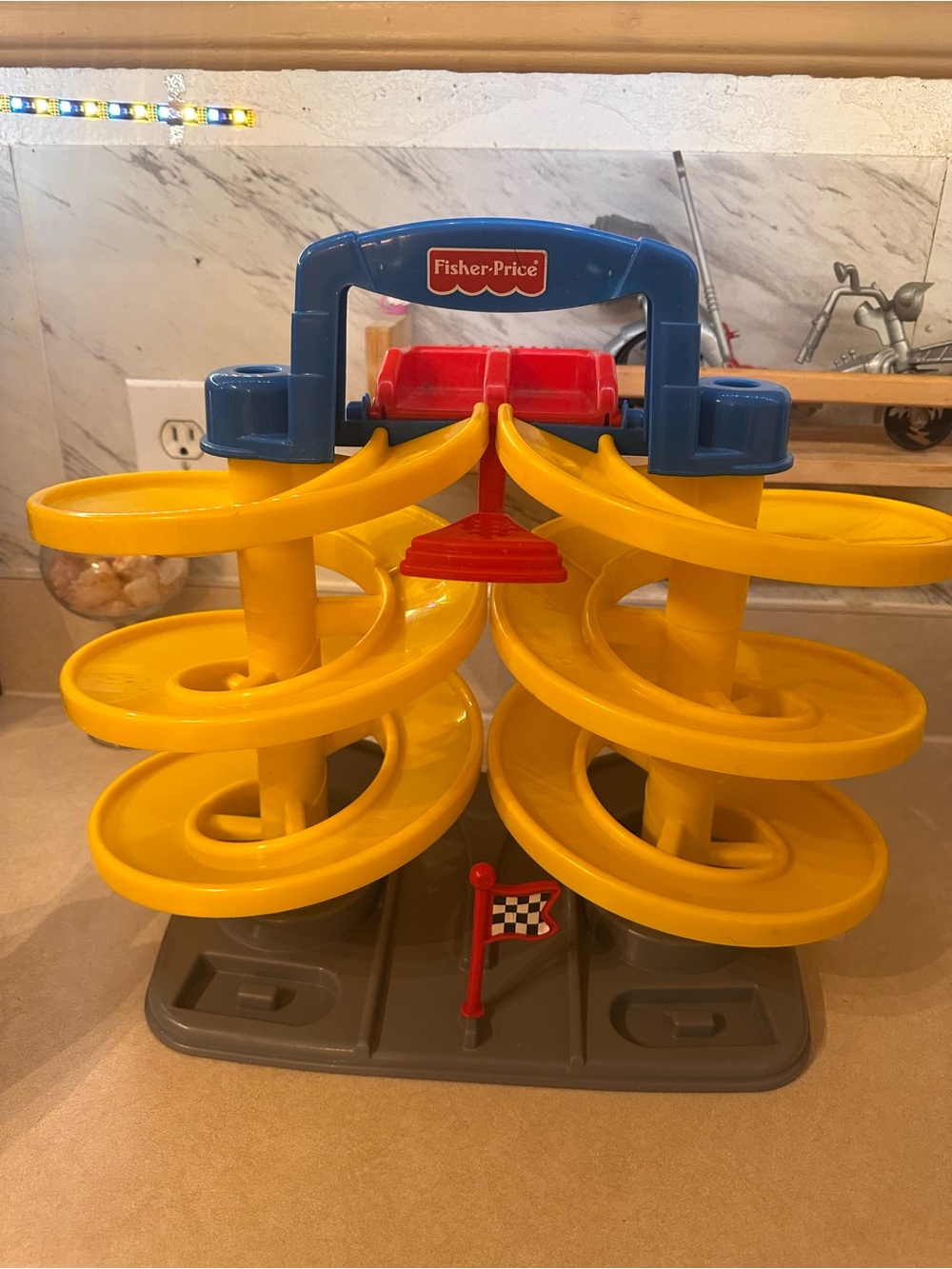 Fisher-Price Yellow Spiral Race Track with Blue Top and Red Accents